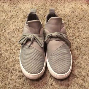 Gray and white Steve Madden sneakers